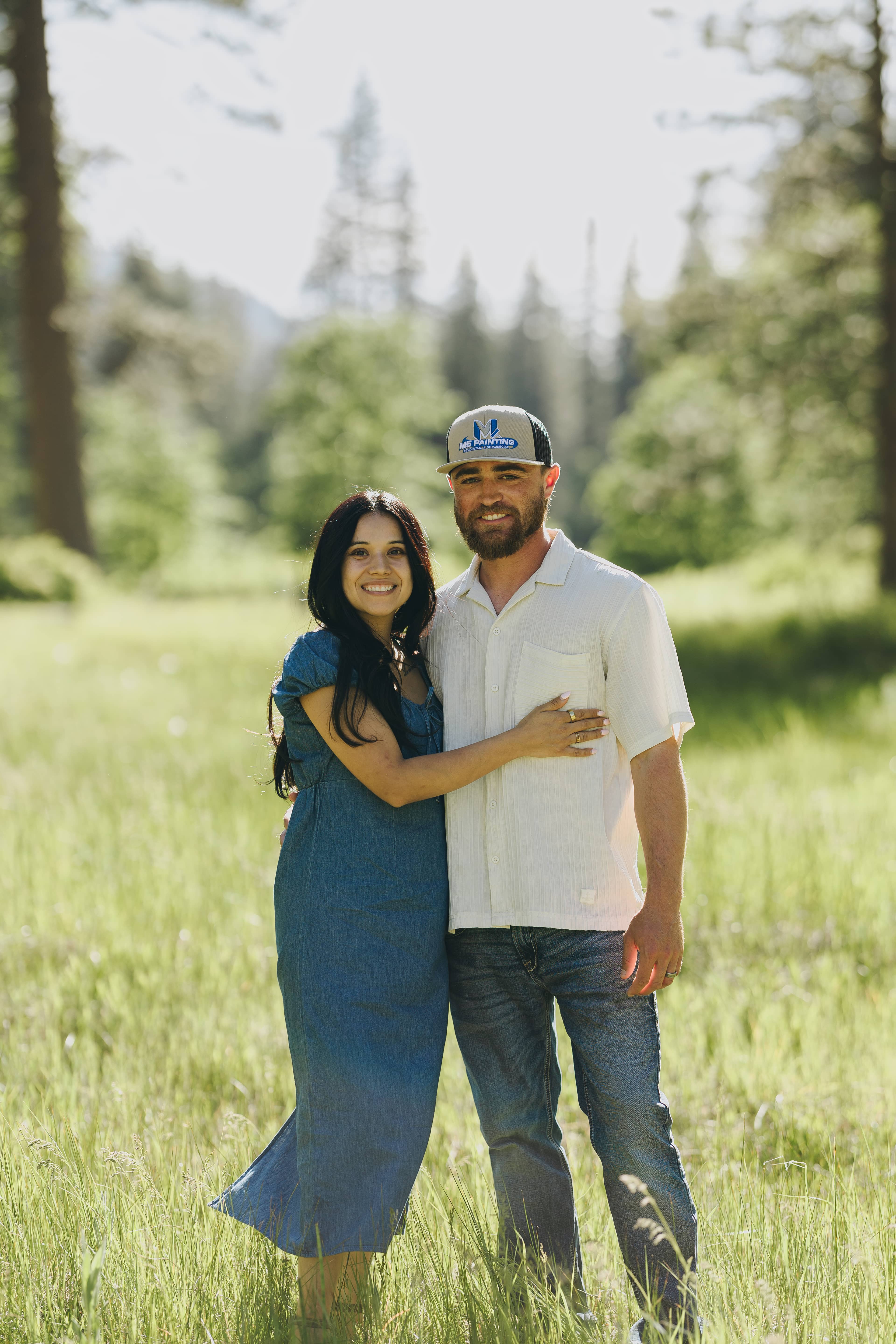 Matt and Leslie standing together