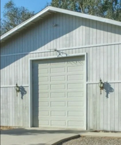 Painted garage exterior by M5 Painting